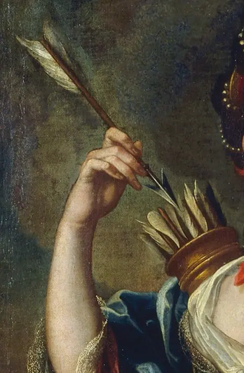 A hand forming the shape of an arrow.