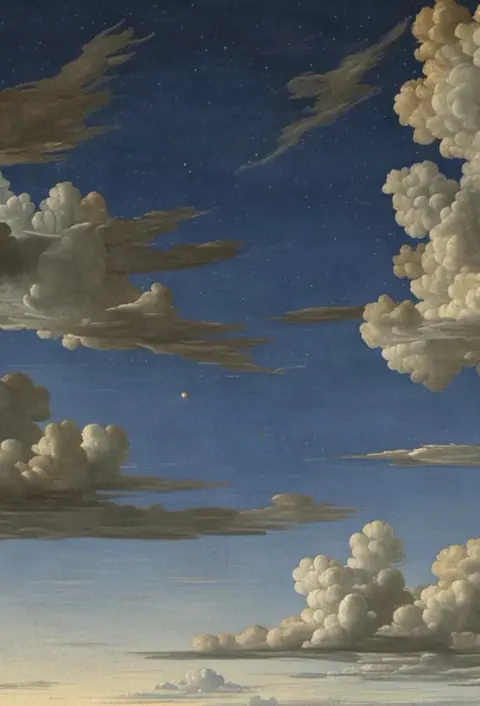 A deep, star-filled night sky.